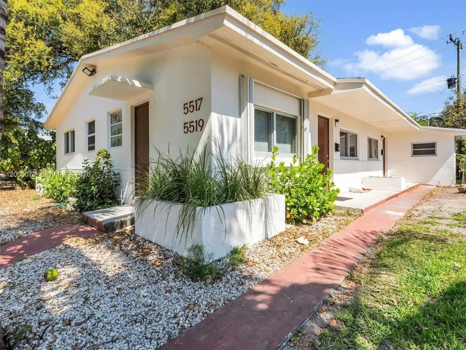 Photo 1 of Multi family home for sale at 5517 Nw 1st Place, Miami, FL 33127 | MLS# A12066073 | Listing updated on 2026-09-29