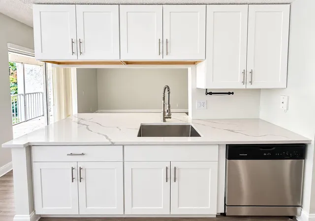 Listing Photo 4 - Condo for sale in building located at 5612 Rock Island Rd, Tamarac, FL 33319 - Unit #172