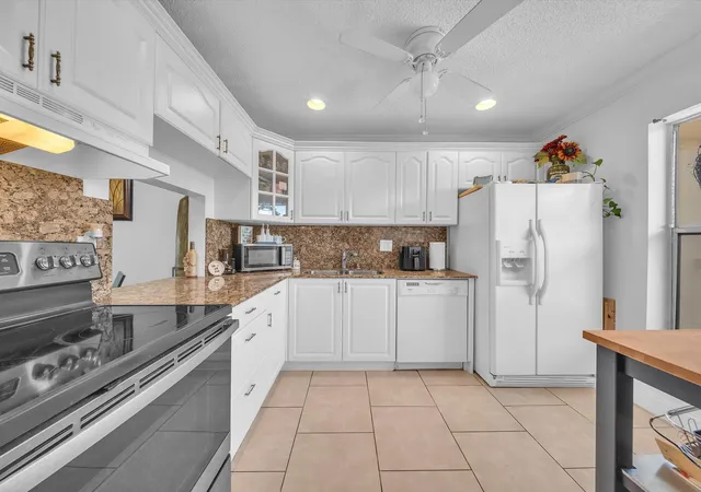 Photo 4 of Condo for sale at 6051 NW 61st Avenue #310, Tamarac, FL 33319 | MLS# B26064184 | Listing updated on 2026-09-23