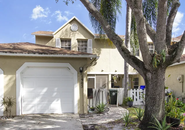 Photo 1 of Townhouse for sale at 1905 Maplewood Dr, Greenacres, FL 33415 | MLS# B26064474 | Listing updated on 2026-09-23