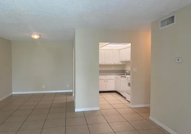 Listing Photo 3 - Condo for sale in building located at 409 Executive Ctr Dr, West Palm Beach, FL 33401 - Unit #211