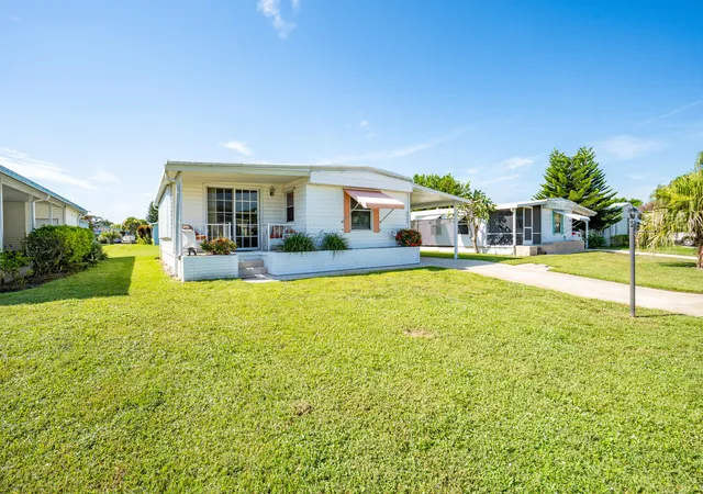 Photo 3 of Manufactured home for sale at 6948 Se Delegate St, Hobe Sound, FL 33455 | MLS# B26065749 | Listing updated on 2026-09-23
