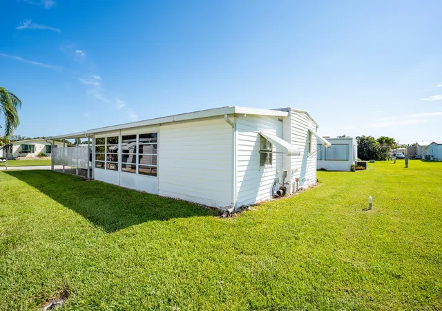 Photo 3 of Manufactured home for sale at 6948 SE Delegate St, Hobe Sound, FL 33455 | MLS# B26065749 | Listing updated on 2026-09-23