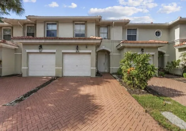 Photo 1 of Townhouse for sale at 6119 Seminole Gdns Cir, Riviera Beach, FL 33418 | MLS# B26065828 | Listing updated on 2026-10-08