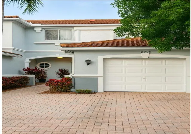 Photo 1 of Townhouse for sale at 2303 Ctr Stone Ln, Riviera Beach, FL 33404 | MLS# B26065857 | Listing updated on 2026-09-28