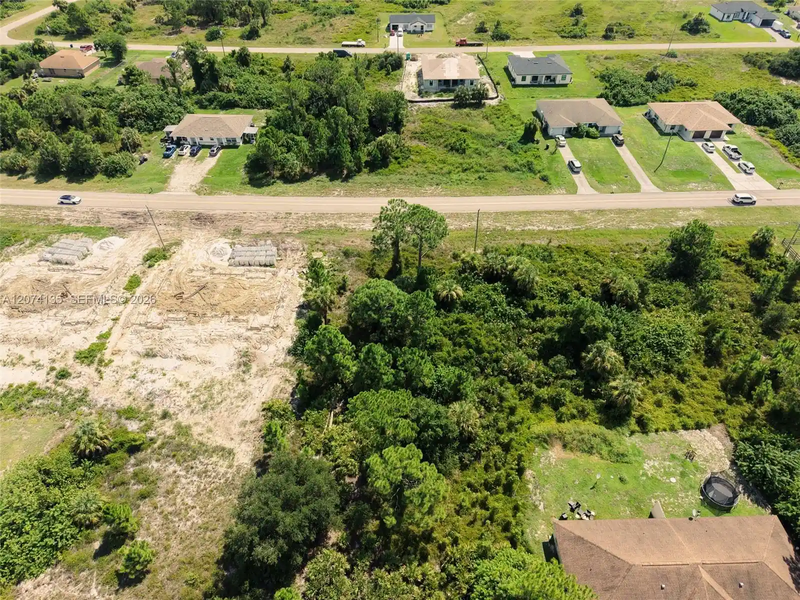 Photo 1 of Land for sale at 960 Eisenhower Blvd, Lehigh Acres, FL 33974 | MLS# A12074135 | Listing updated on 2026-10-30