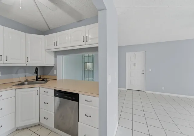 Photo 3 of Condo for sale at 728 Sunny Pine Way #A1, Greenacres, FL 33415 | MLS# B26066318 | Listing updated on 2026-09-23