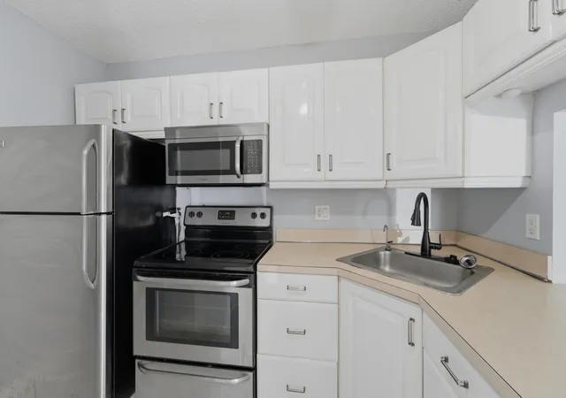 Listing Photo 4 - Condo for sale in building located at 728 Sunny Pine Wy, Greenacres, FL 33415 - Unit #A1