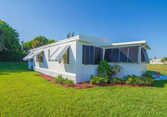Photo 2 of Manufactured home for sale at 385 Ne Jade Cir, Jensen Beach, FL 34957 | MLS# B26066401 | Listing updated on 2026-09-28