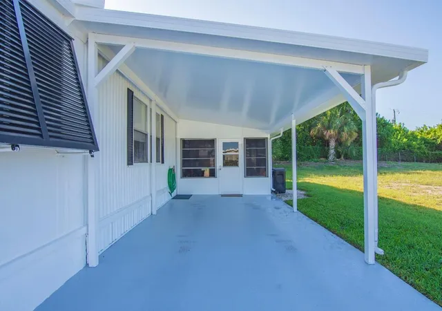 Photo 3 of Manufactured home for sale at 385 Ne Jade Cir, Jensen Beach, FL 34957 | MLS# B26066401 | Listing updated on 2026-09-28
