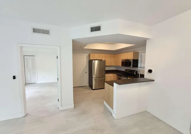 Photo 3 of Condo for sale at 7516 Ne 1 Avenue #302, Miami, FL 33138 | MLS# B26066442 | Listing updated on 2026-09-23