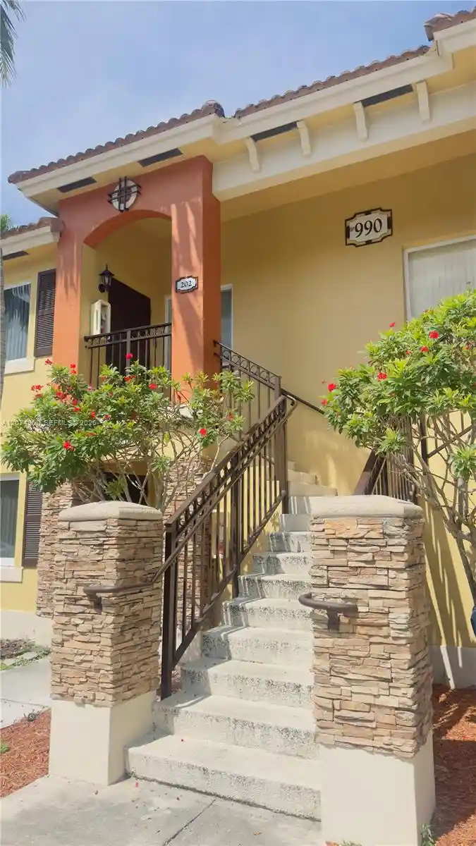 Listing Photo 1 - Condo for sale in 990 Ne 33Rd Ter located at 990 Ne 33Rd Ter, Homestead, FL 33033 - Unit #202