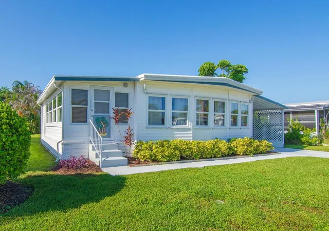 Photo 2 of Manufactured home for sale at 58 Village Ln, Jensen Beach, FL 34957 | MLS# B26066630 | Listing updated on 2026-09-23