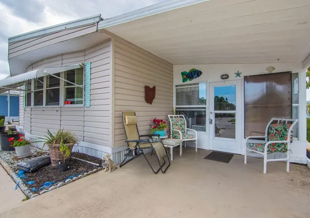 Photo 2 of Manufactured home for sale at 293 Ne Moonstone Dr, Jensen Beach, FL 34957 | MLS# B26066937 | Listing updated on 2026-09-28