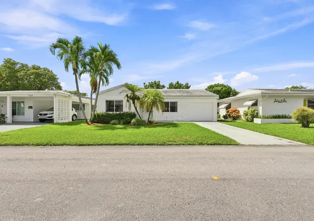 Photo 2 of Single family home for sale at 7104 Nw 70th Ct, Tamarac, FL 33321 | MLS# B26067286 | Listing updated on 2026-10-04