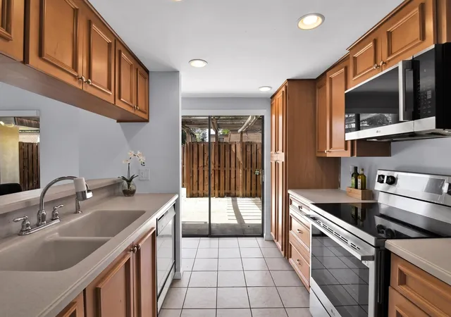 Photo 3 of Townhouse for sale at 1821 18th Ln, Greenacres, FL 33463 | MLS# B26067353 | Listing updated on 2026-10-08