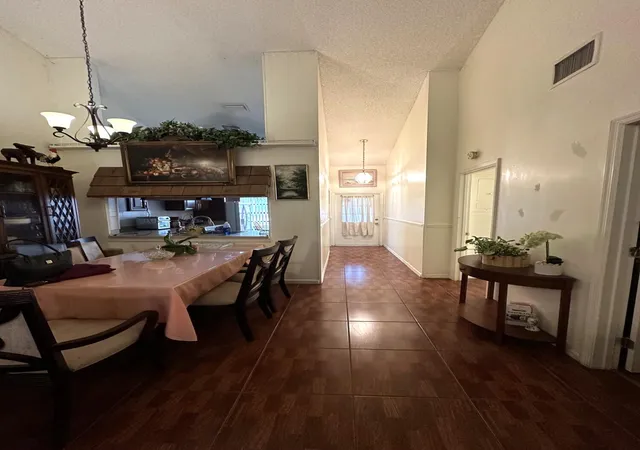 Photo 3 of Single family home for sale at 1040 Parkside Green Dr #C, Greenacres, FL 33415 | MLS# B26068118 | Listing updated on 2026-09-28