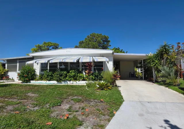 Photo 1 of Manufactured home for sale at 6125 N Guava Ln, Atlantis, FL 33462 | MLS# B26068247 | Listing updated on 2026-09-23