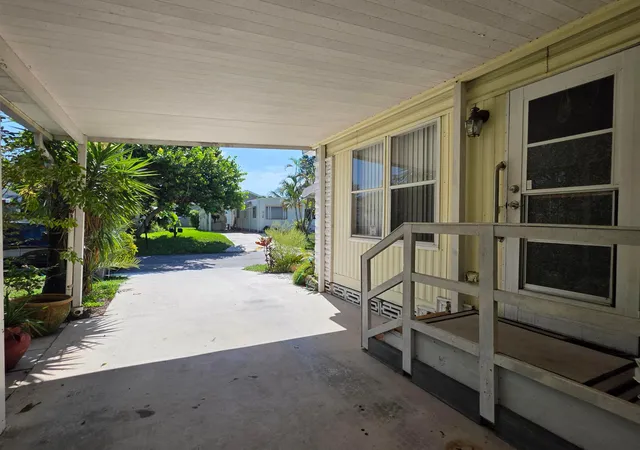 Photo 2 of Manufactured home for sale at 6125 N Guava Ln, Atlantis, FL 33462 | MLS# B26068247 | Listing updated on 2026-09-23