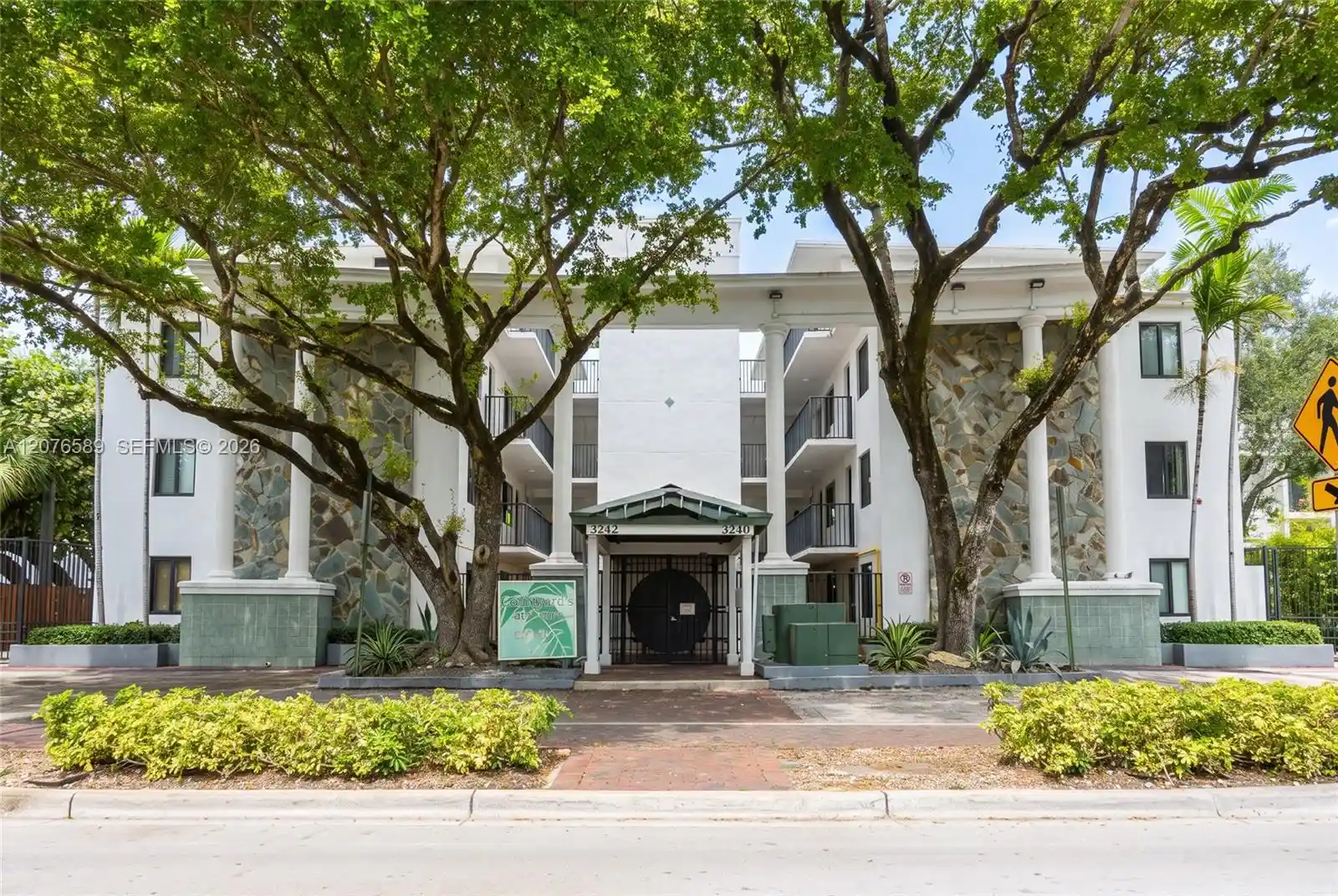 Listing Photo 1 - Condo for sale at Courtyards Of The Grove, Unit S308 3240 Mary St, Courtyards Of The Grove, Miami, FL 33133 | Built Year: undefined - undefined