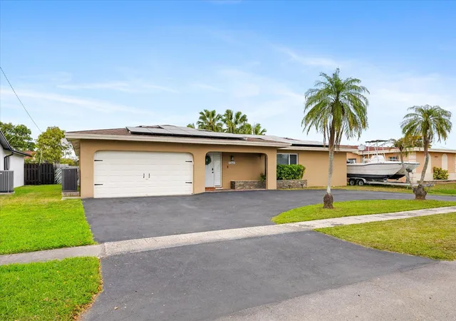 Photo 2 of Single family home for sale at 10661 Nw 27th Ct, Sunrise, FL 33322 | MLS# B26068402 | Listing updated on 2026-09-23
