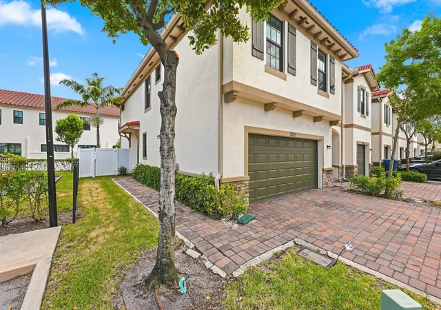 Photo 2 of Townhouse for sale at 2011 Tamarind Dr, Riviera Beach, FL 33410 | MLS# B26068678 | Listing updated on 2026-10-09