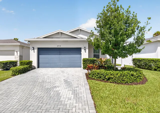 Single family home for sale at 6710 Pointe Of Woods Dr, West Palm Beach, FL 33413 | MLS# B26068797