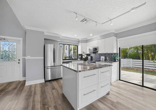 Photo 4 of Townhouse for sale at 324 W Pine St #11, Lantana, FL 33462 | MLS# B26069284 | Listing updated on 2026-10-10