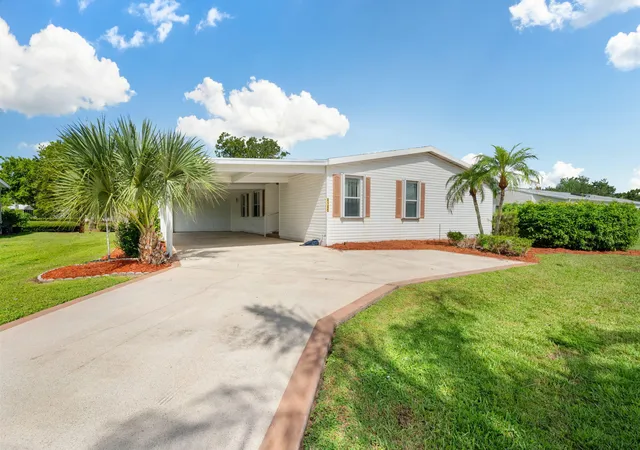 Photo 1 of Manufactured home for sale at 8185 14th Hole Dr, Port St Lucie, FL 34952 | MLS# B26069722 | Listing updated on 2026-10-02