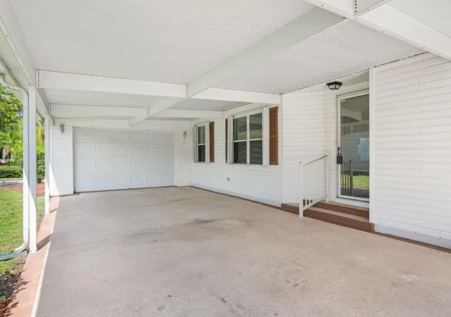 Photo 2 of Manufactured home for sale at 8185 14th Hole Dr, Port St Lucie, FL 34952 | MLS# B26069722 | Listing updated on 2026-10-02