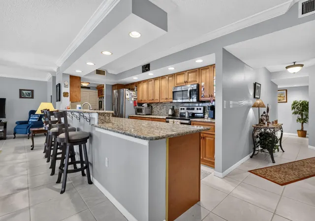 Photo 3 of Condo for sale at 103 Half Moon Cir #H1, Hypoluxo, FL 33462 | MLS# B26070032 | Listing updated on 2026-10-08