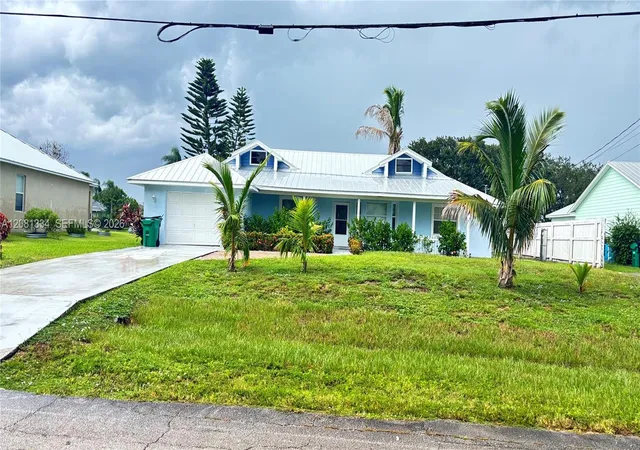 Photo 1 of Single family home for sale at 445 Sw Cherryhill Rd, Port Saint Lucie, FL 34953 | MLS# A12081334 | Listing updated on 2026-10-31