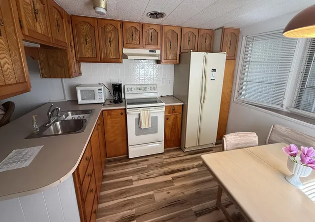 Photo 3 of Manufactured home for sale at 11055 Se Federal Hwy #97, Hobe Sound, FL 33455 | MLS# B26071130 | Listing updated on 2026-09-23