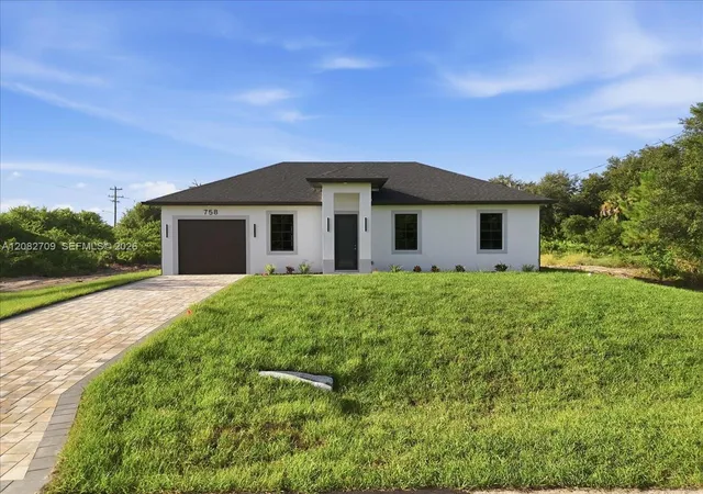 Photo 2 of Single family home for sale at 758 Long Distance Ln, Lehigh Acres, FL 33974 | MLS# A12082709 | Listing updated on 2026-10-30