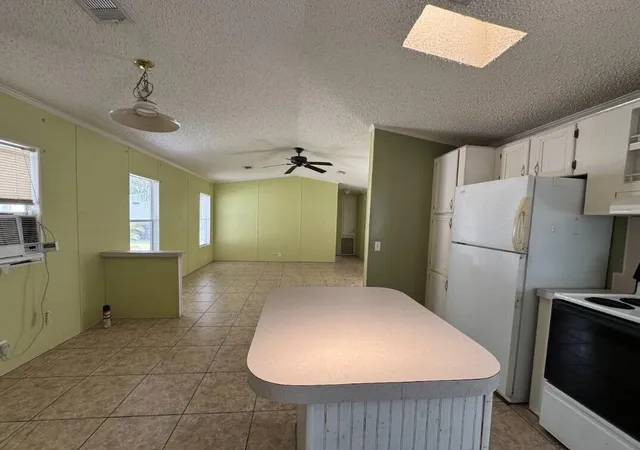 Photo 3 of Manufactured home for sale at 104 Plantation Blvd #104, Lake Worth, FL 33467 | MLS# B26072163 | Listing updated on 2026-09-30