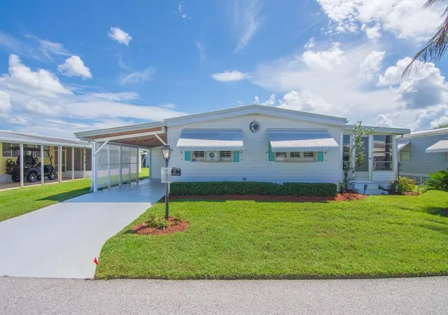 Photo 1 of Manufactured home for sale at 212 Ne Forrest Ct, Jensen Beach, FL 34957 | MLS# B26073182 | Listing updated on 2026-09-23