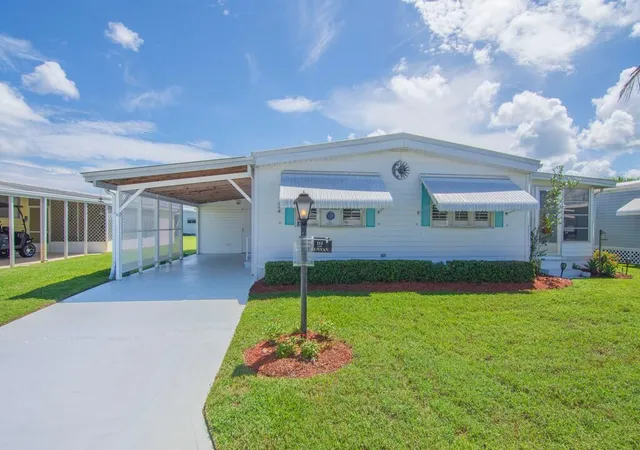 Photo 2 of Manufactured home for sale at 212 Ne Forrest Ct, Jensen Beach, FL 34957 | MLS# B26073182 | Listing updated on 2026-09-23