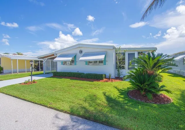 Photo 3 of Manufactured home for sale at 212 Ne Forrest Ct, Jensen Beach, FL 34957 | MLS# B26073182 | Listing updated on 2026-09-23