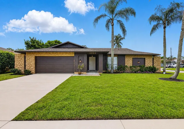 Single family home for sale at 1058 Fernlea Dr, West Palm Beach, FL 33417 | MLS# B26073375