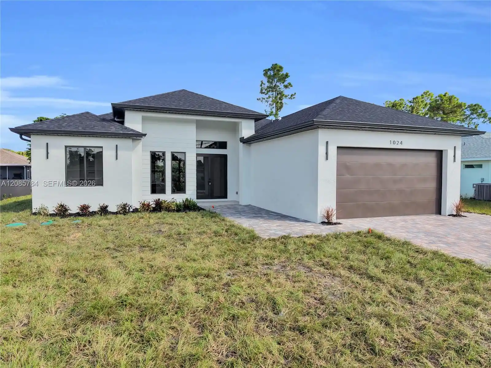 Photo 1 of Single family home for sale at 1024 Alvin Ave, Lehigh Acres, FL 33971 | MLS# A12085784 | Listing updated on 2026-10-26