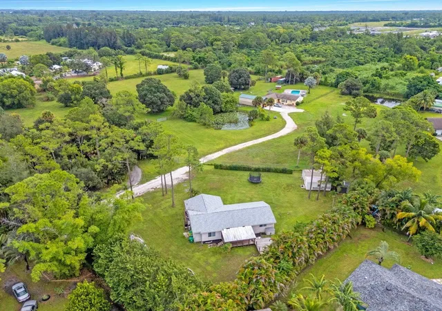 Photo 1 of Sale Pending at 14895 24th Circle N, Loxahatchee, FL 33470 | MLS# B26073966 | Listing updated on 2026-10-01