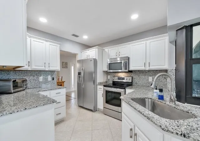 Photo 4 of Single family home for sale at 711 NW 45th Avenue, Coconut Creek, FL 33066 | MLS# B26074589 | Listing updated on 2026-10-10