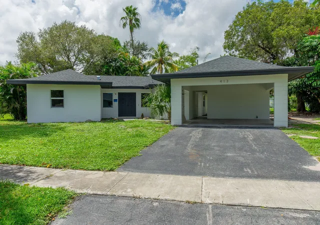 Single family home for sale at 413 N Ware Dr, West Palm Beach, FL 33409 | MLS# B26075149
