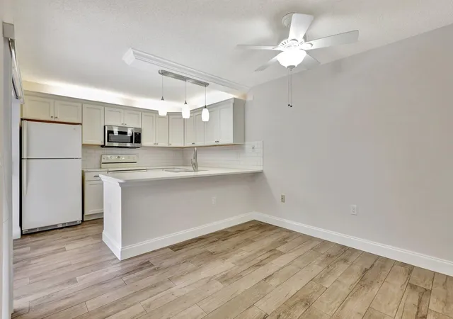 Photo 1 of Townhouse for sale at 7118 71st Way, West Palm Beach, FL 33407 | MLS# B26075884 | Listing updated on 2026-10-10