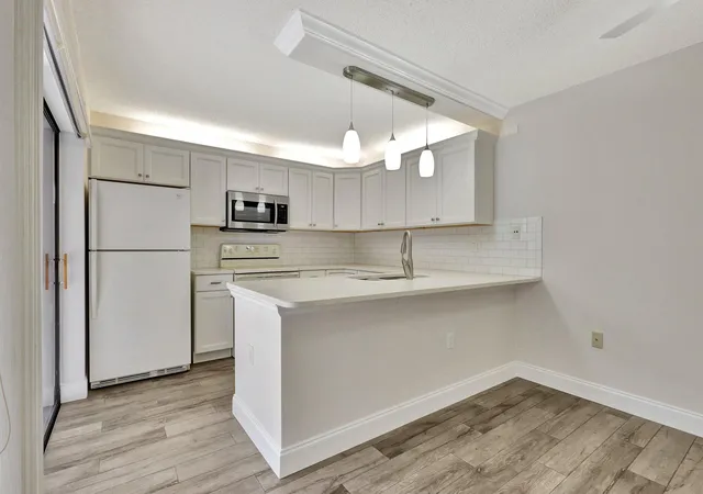 Photo 3 of Townhouse for sale at 7118 71st Way, West Palm Beach, FL 33407 | MLS# B26075884 | Listing updated on 2026-10-10