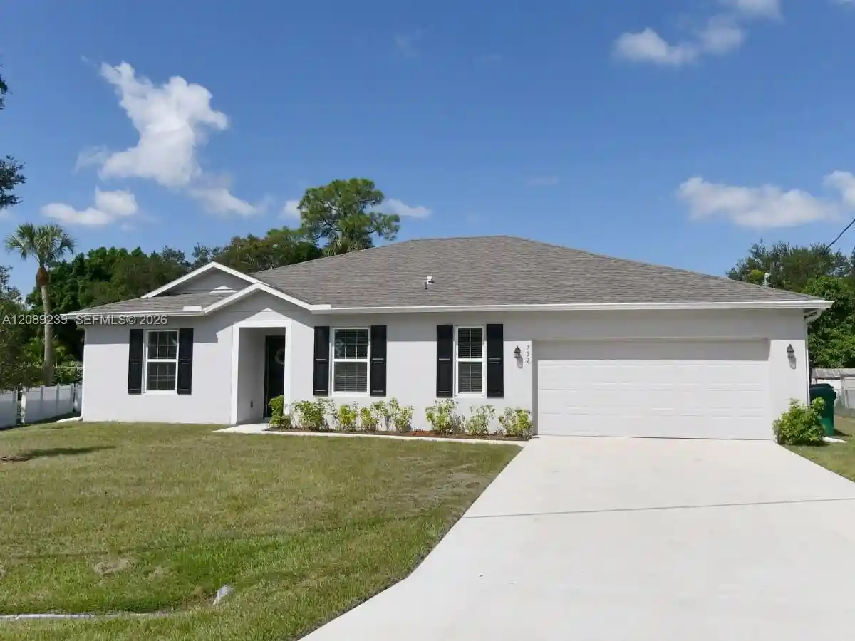 Photo 1 of Single family home for sale at 702 Sw Aster Rd, Port Saint Lucie, FL 34953 | MLS# A12089239 | Listing updated on 2026-10-30