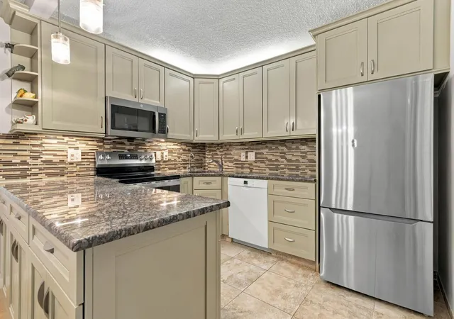Photo 2 of Condo for sale at 308 Knotty Pine Cir #D-1, Greenacres, FL 33463 | MLS# B26076659 | Listing updated on 2026-10-10