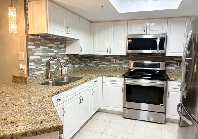 Photo 1 of Condo for sale at 1000 Crestwood Ct S #1005, Royal Palm Beach, FL 33411 | MLS# B26076992 | Listing updated on 2026-10-10