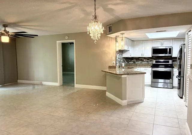 Photo 2 of Condo for sale at 1000 Crestwood Ct S #1005, Royal Palm Beach, FL 33411 | MLS# B26076992 | Listing updated on 2026-10-10