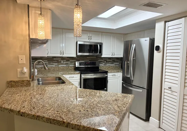 Photo 3 of Condo for sale at 1000 Crestwood Ct S #1005, Royal Palm Beach, FL 33411 | MLS# B26076992 | Listing updated on 2026-10-10